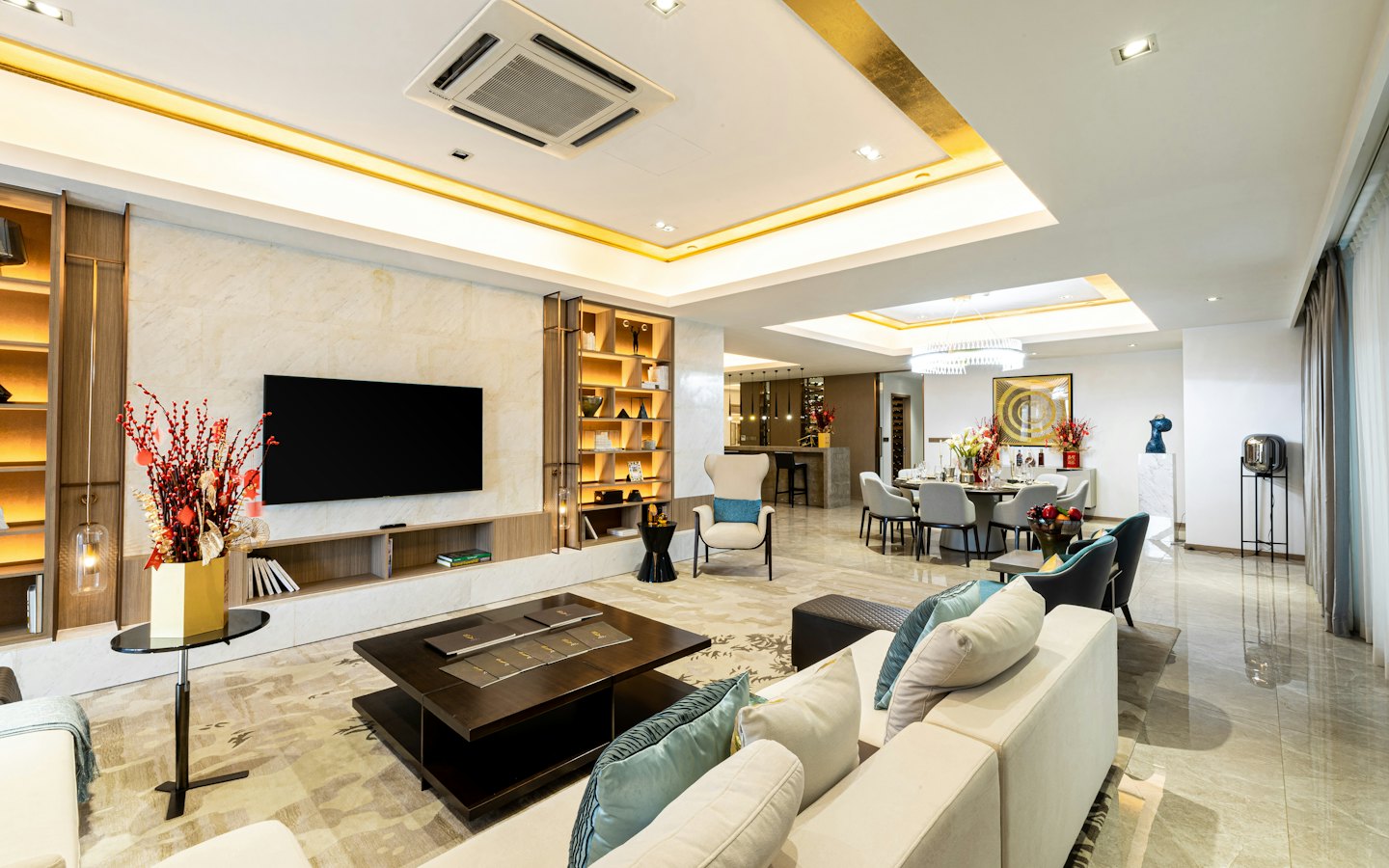 Luxurious open-plan living and dining room with modern furniture.
